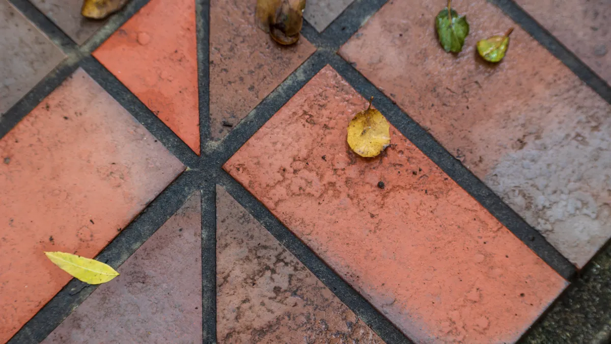 How Slip-Resistant Is a Stamped Concrete Patio? Patterned paving stones with leaves