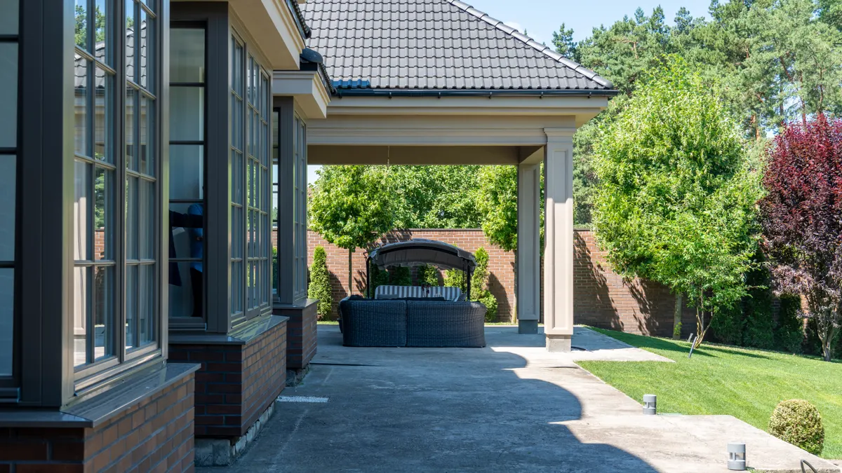 How to Combine Multiple Stamp Patterns on One Patio House side patio or driveway with smooth paving